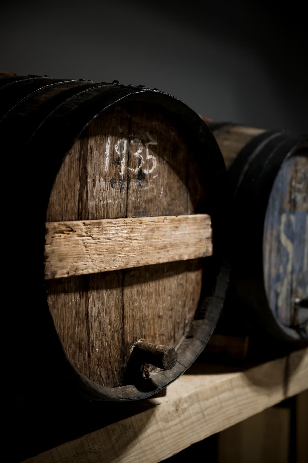 Rows of whiskey barrels aging in the rickhouse